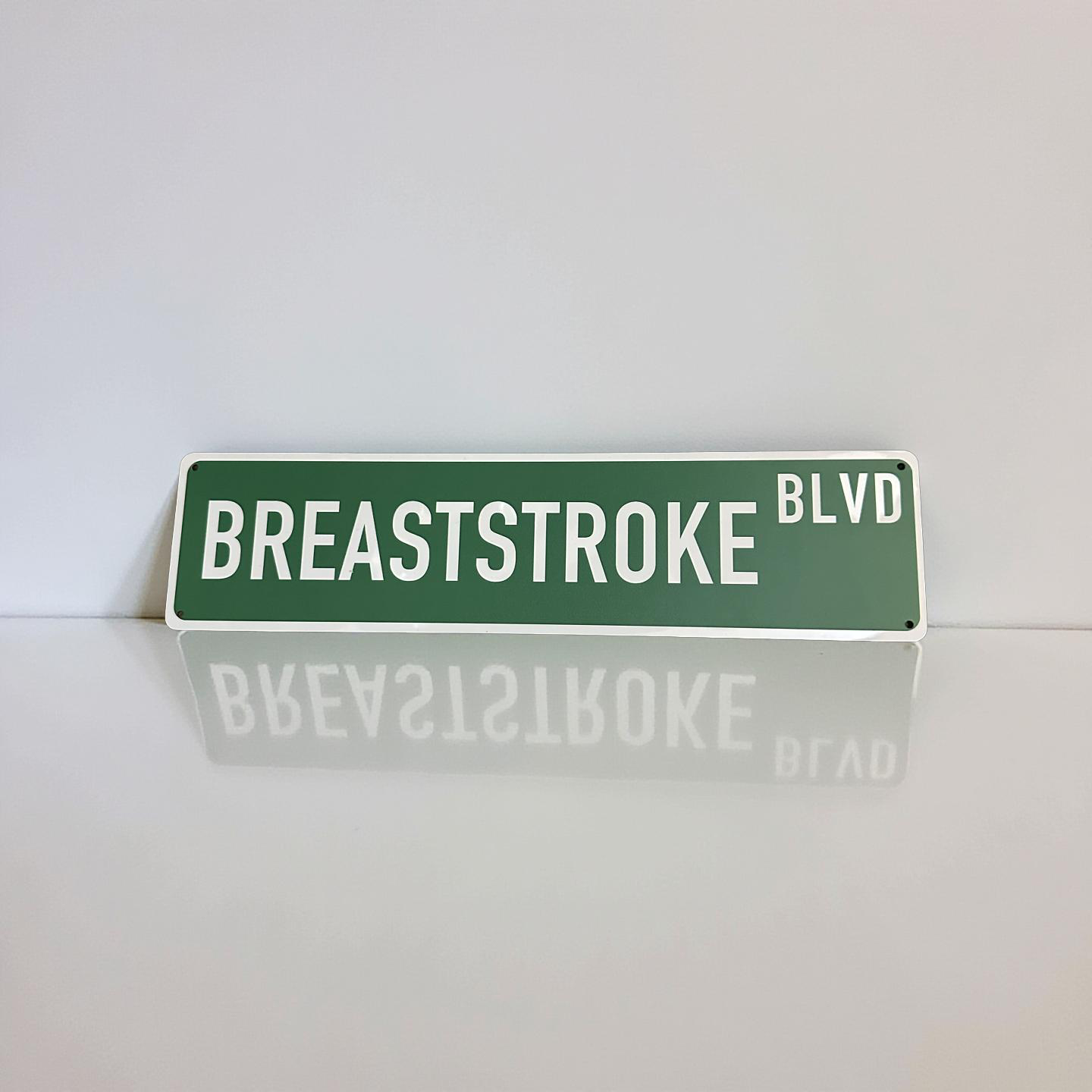 STREET SIGN  - BREASTSTROKE BLVD - GREEN/WHITE